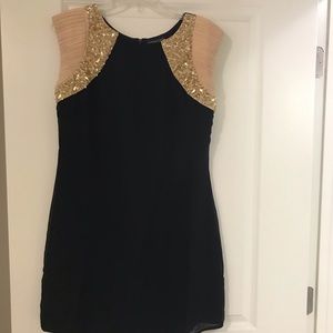 Black and gold mini cocktail dress